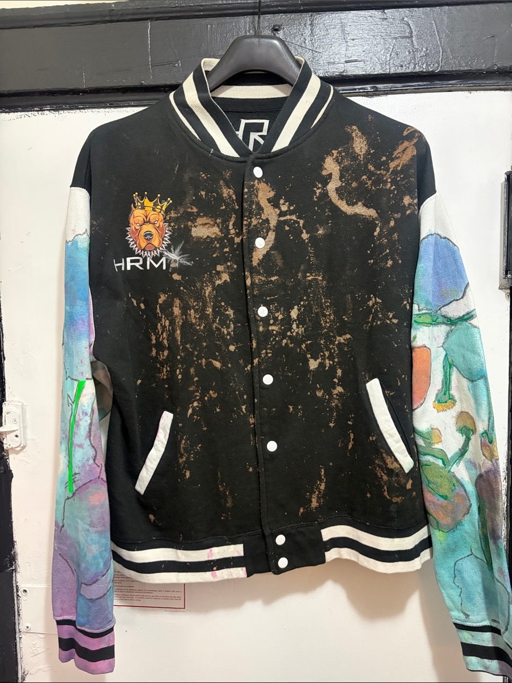Black Paint-Splatter Varsity Jacket with Multicolor Sleeves